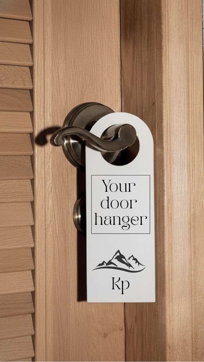 Door hanger with 'Your door hanger Kp' text attached to a wooden door handle.