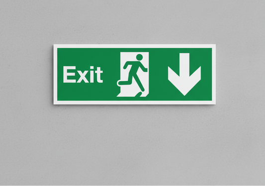 Green exit sign with white symbols on a gray background