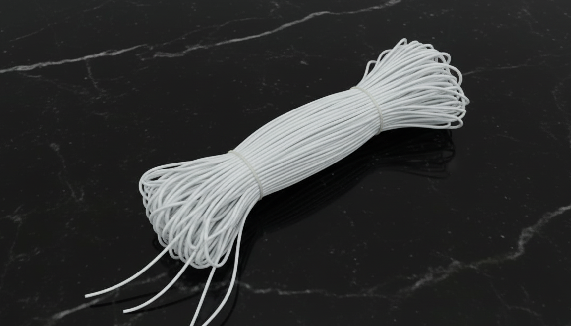 White rope on a black marble surface