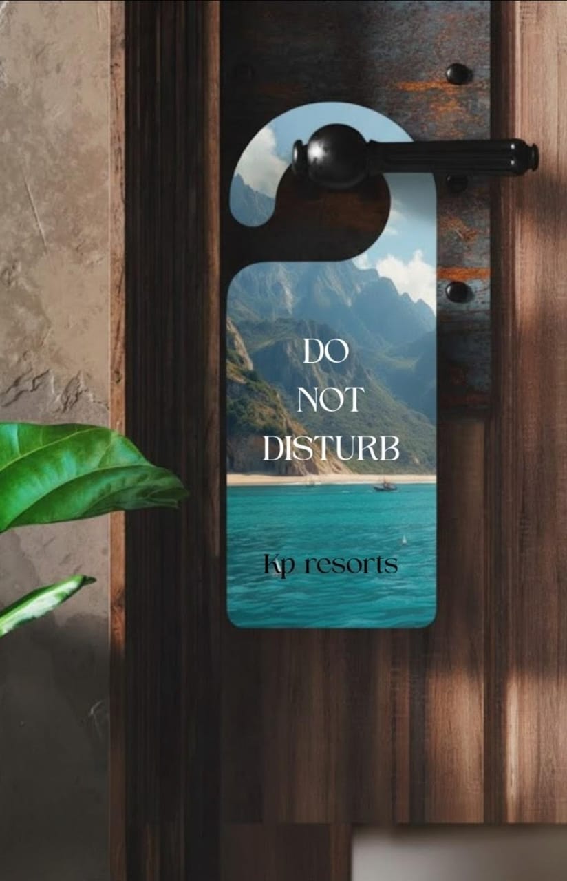 Door hanger with scenic design and 'Do Not Disturb' text on a wooden door.